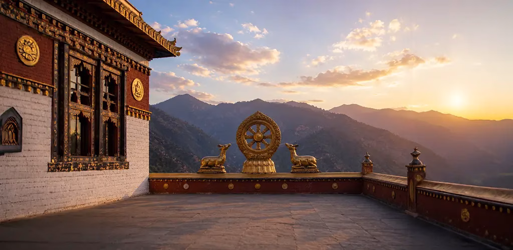 two kneeling deer on a monastery's rooftop