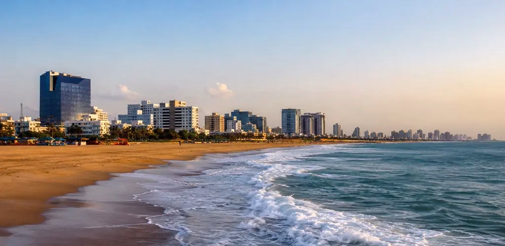 modern-day Chennai skyline along the same coastline where Madraspatnam once stood