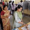 Indian citizens casting their votes at a polling station