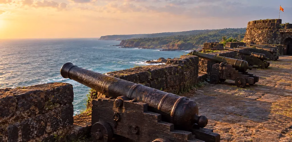 Cannons still standing along the ramparts of Vijaydurg fort