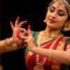 A classical Indian dancer performing an intricate hand mudra